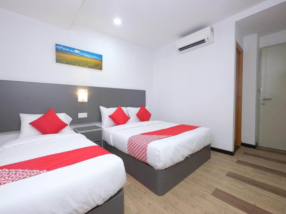 โอโย 44043 เฟิสต์ การ์เดน โฮเต็ล Hotel กวนตัน ภายนอก รูปภาพ